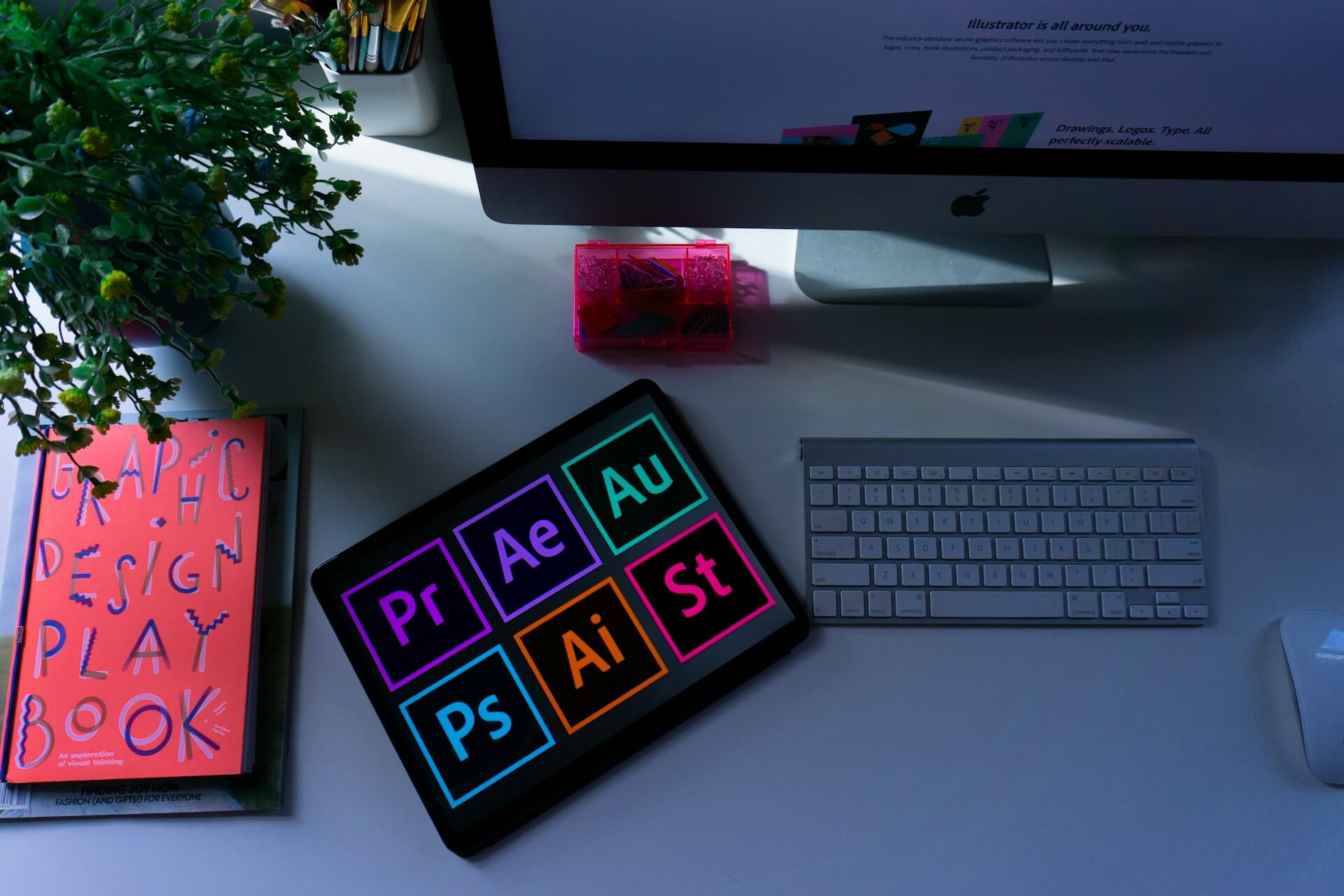 Designer working on brand identity concepts with color swatches and sketches on a desk