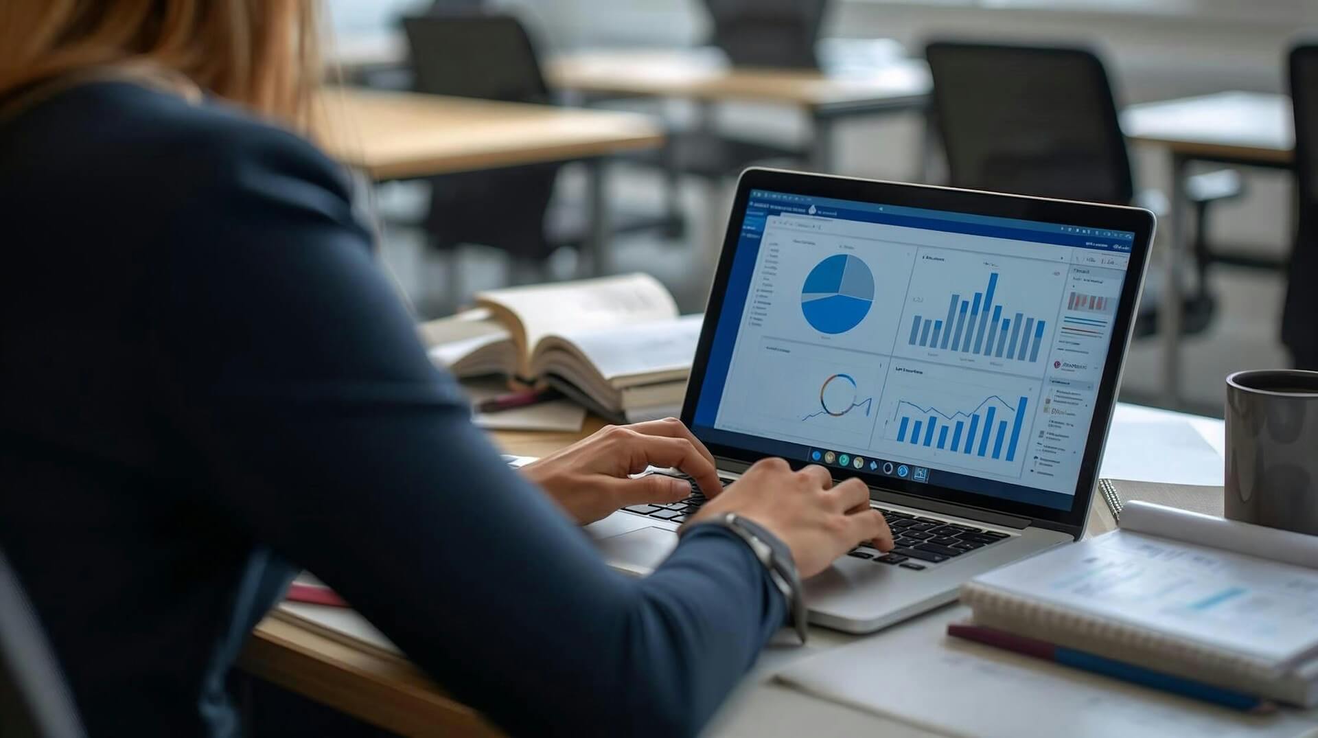 Laptop screen showing website analytics with a business owner looking concerned